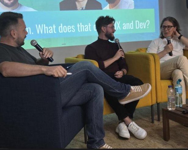 Marcin on the panel at UXDX Warsaw with Szymon Trzepla and Małgorzata Wyczańska