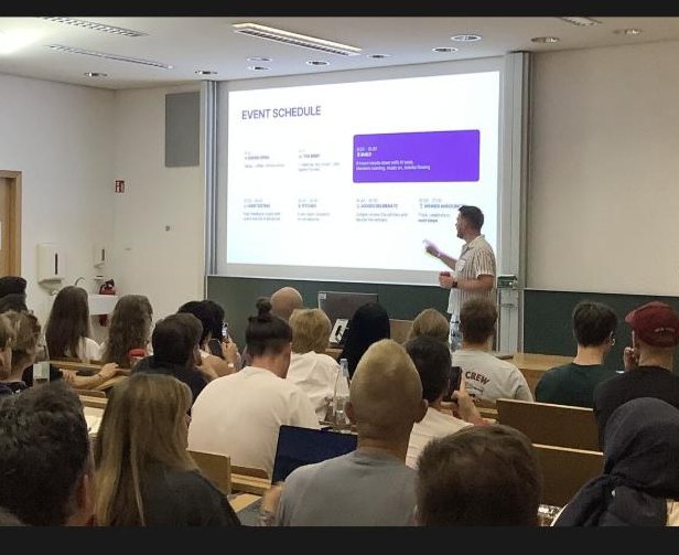 Marcin presenting the Product Build Day method to a full lecture hall at UX Camp Europe