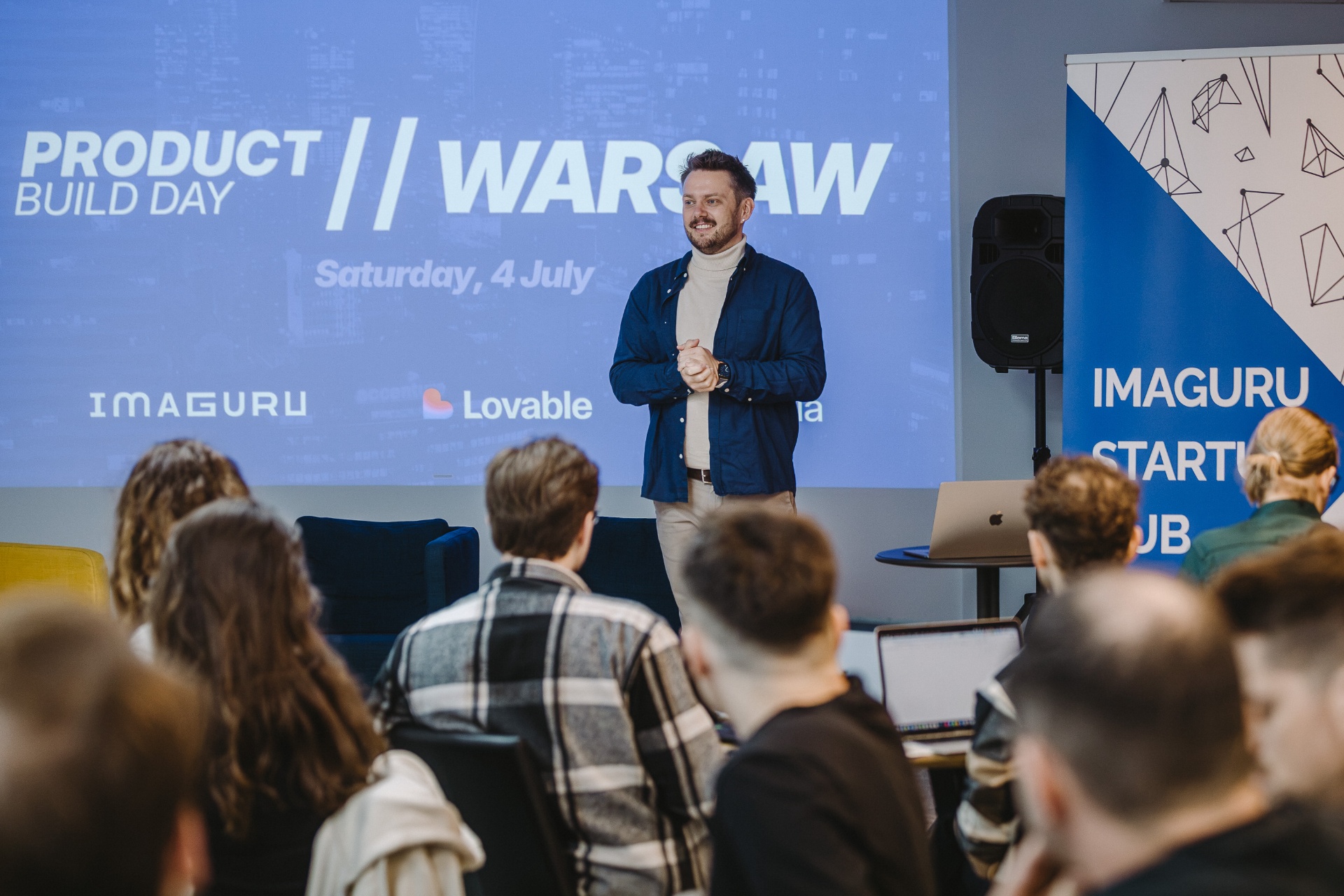 Speaker on stage at Product Build Day Warsaw, July 2026